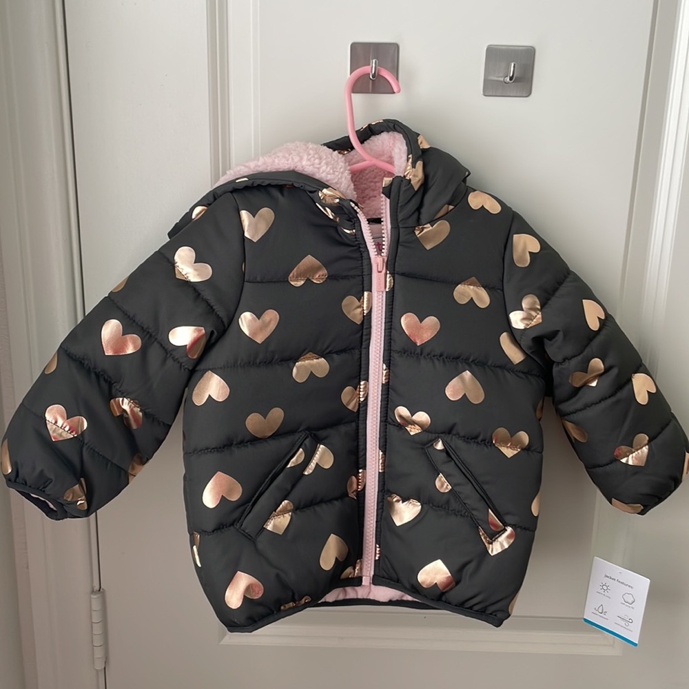 Carter’s Puffer Jacket Brand New w/Foil hearts. Size 24mos
